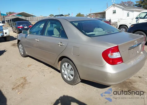 2003 Toyota Camry Le z USA, uszkodzony, nr VIN 4T1BE32K93U180713